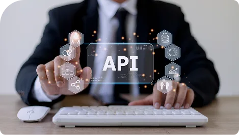 Person using a computer with an API interface graphic